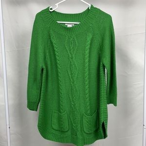 Green sweater, size medium.
